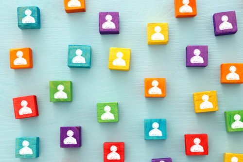 image of colorful blocks with people icons over wooden table ,human resources and management concept.