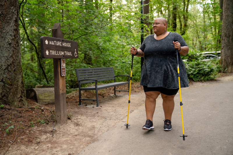 Woman Walking Towards Nature House Thinking About What is IDD