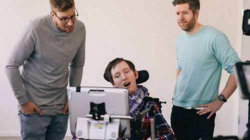 Disabled Guy Watching Movie With His Friends